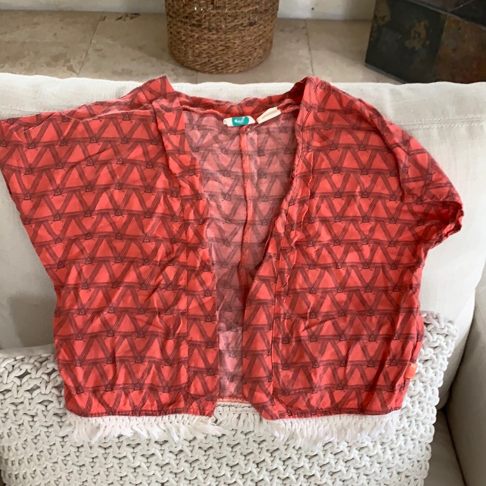 Roxy cotton shrug with fringe detail on hem